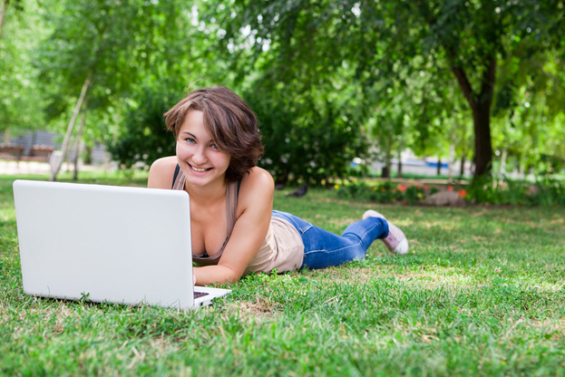 "Girl with Laptop Outside" by CollegeDegrees360 is licensed under CC BY-SA 2.0